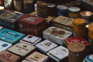 collection of vintage tins flea market negotiation