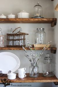 open kitchen shelving with trinkets and plates