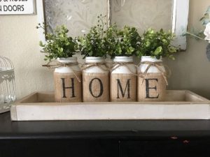 Mason Jars with burlap that spells HOME