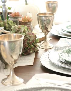 Silver goblets add a magical touch to this elegant halloween tablescape.