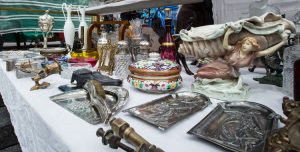 A table full of second-hand items at an estate sale