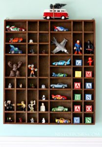 Display of child's trucks and other small toys