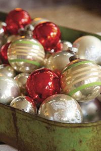 Collection of red, white, and green vintage Shiny Brite ornaments