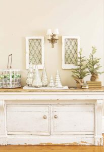 Vintage general store counter refurbished into a sideboard cabinet and decorated for Christmas