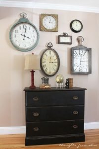 a collection of mounted clocks