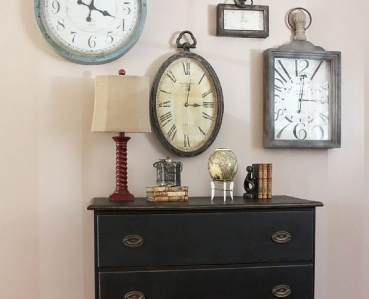 a collection of mounted clocks