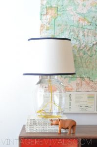 A lamp that is fashioned with a color pop cord in its glass base.