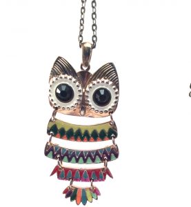 This vintage necklace has a colorfully bejeweled owl pendant