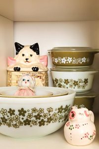 Vintage green floral Pyrex with vintage pottery