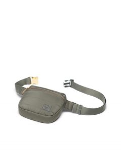 An olive-green quilted hip pack with one pouch—not too big but large enough to carry the things you need.