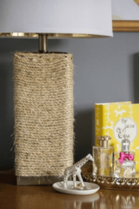 A vintage lamp wrapped in twine.