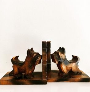 These vintage hand-carved Scottie dog bookends have a slightly charred look that only adds to their charm.
