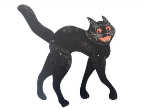A vintage Halloween paper cut out of a scared black cat.