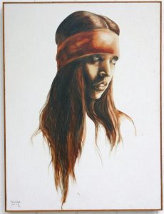 This vintage portrait is of an Indian teenage girl with a large, red forehead band and long brown hair.