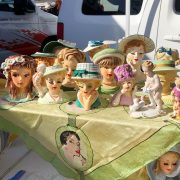 Video that tours vintage finds at the Long Beach flea market with Emily Vallely