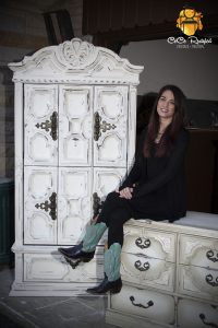 Photo portrait of CeCe Hunt in front of a CeCe Restyled creation.