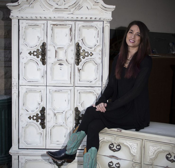 Photo portrait of CeCe Hunt in front of a CeCe Restyled creation.