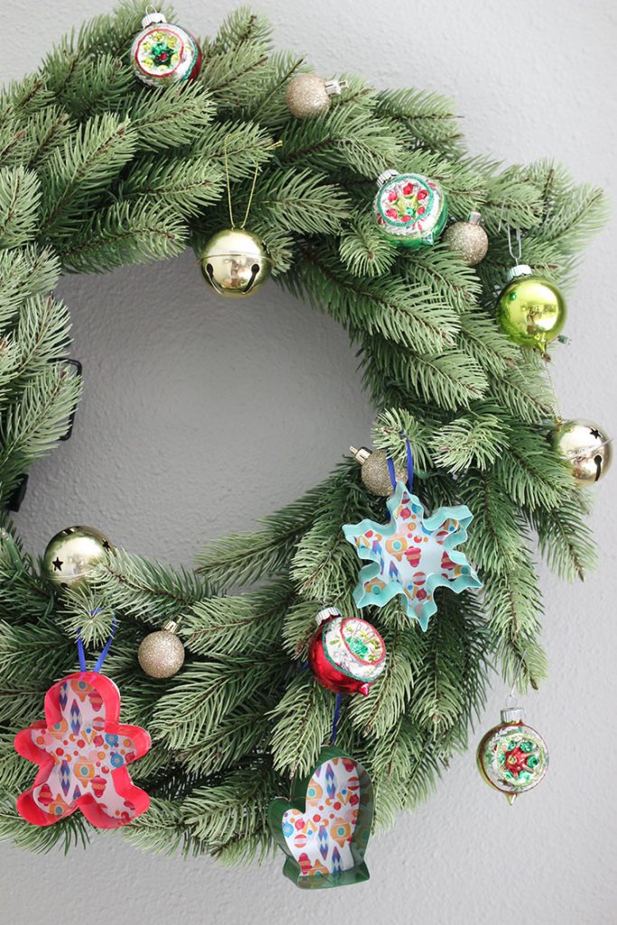Christmas wreath with vintage and handmade ornaments on it