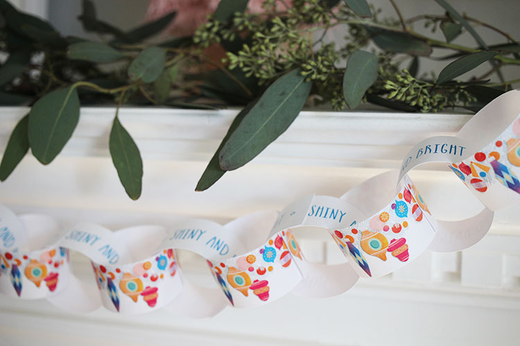 paper chain garland hung across a mantel.