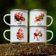 Metal Santa mugs with different vintage-inspired illustrations of Santa and personalized names on them.