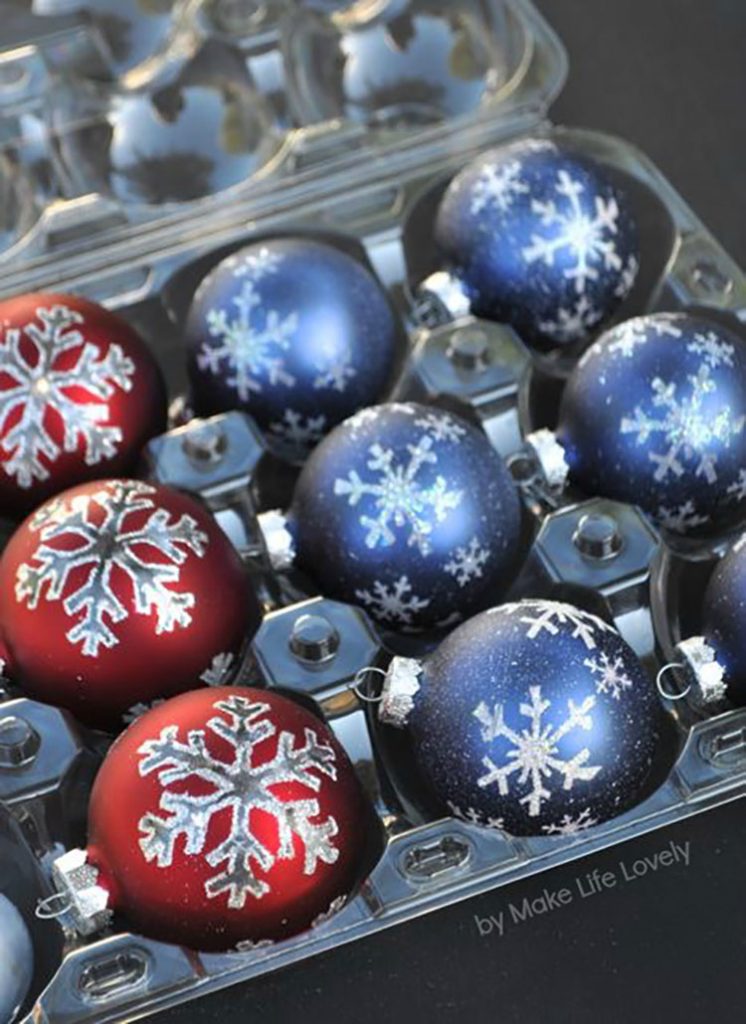 ornaments in an apple container for storage