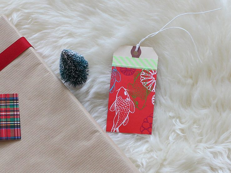 Upcycled holiday gift wrap with wrapping paper scrap..