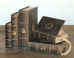Antique-looking books turned into hideaway boxes.