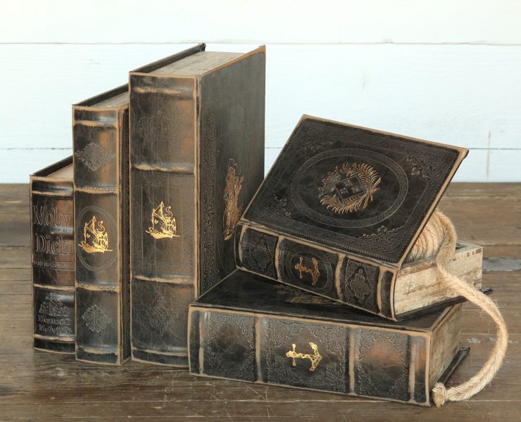 Antique-looking books turned into hideaway boxes.