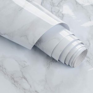 Marble patterned contact paper that is waterproof and easy to remove, one of our favorite gifts for new homeowners!