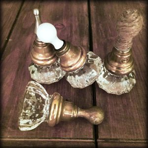Vintage doorknobs made into paperweights.