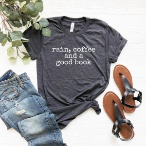 Gray t-shirt with the quote "rain, coffee and a good book" printed on it in typewriter font.