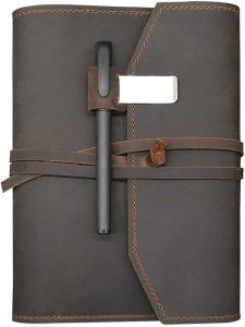 A refillable, leather notebook with an inside pocket and outside pen clip, one of our 'gifts for him.'