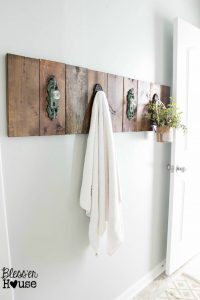 Wall towel rack made with vintage doorknobs.