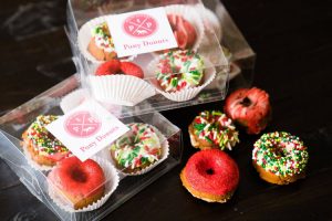 Pony donuts for horses with Christmas frosting and sprinkles.