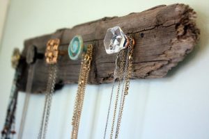 Wall necklace rack made with vintage doorknobs.