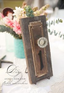 Wooden table number made with a vintage doorknob.