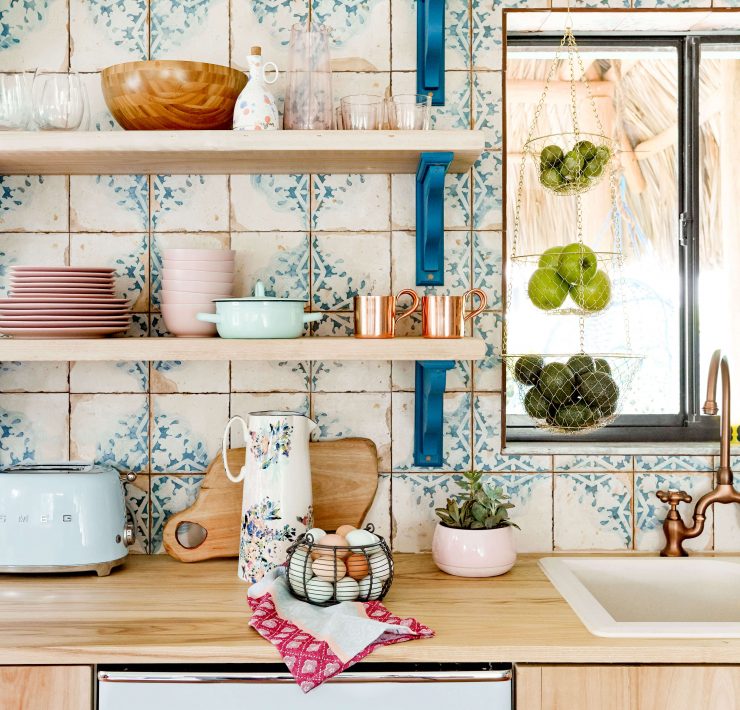 Vintage-inspired backsplash tiles with a blue and cream color scheme.
