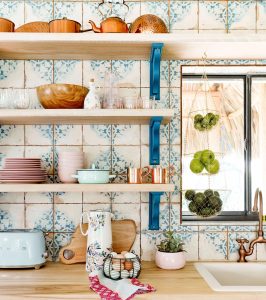 Vintage-inspired backsplash tiles with a blue and cream color scheme.