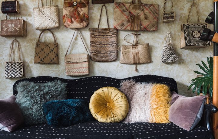 An array of antique purses in different shapes, styles, and colors as a part of Victoria's vintage collectibles.