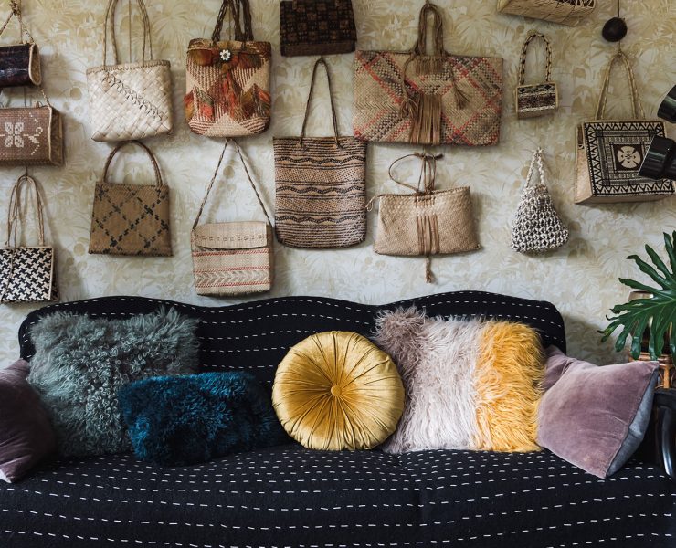 An array of antique purses in different shapes, styles, and colors as a part of Victoria's vintage collectibles.