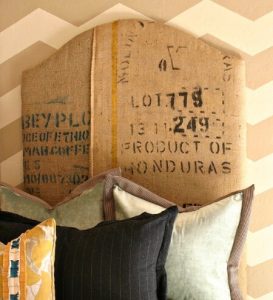 Semicircular headboards made from antique grain sacks.