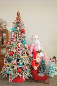 Christmas tree with oversized ornaments and Santas