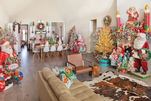 wide angle view of whimsical holiday wonderland with vintage Santas and ornaments