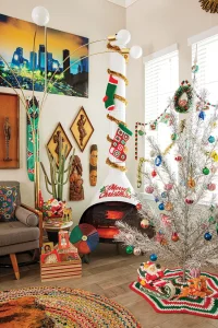 white Malm fireplace with stockings and gold garland