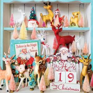 vintage deer and bottlebrush tree vignette