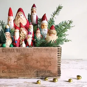 vintage crate filled with wooden St Nicholas figurines
