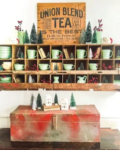 open cabinet with Jadeite cranberry sprigs and bottlebrush trees