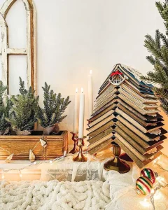 vintage books with bugle ornament create a holiday book tree