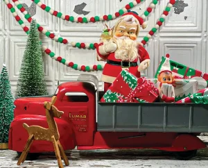 vintage toy truck with elf, Santa figurine and wooden deer