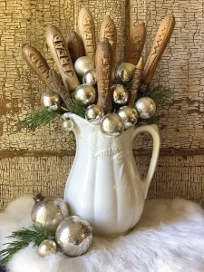 vintage pitcher decorated with ornaments